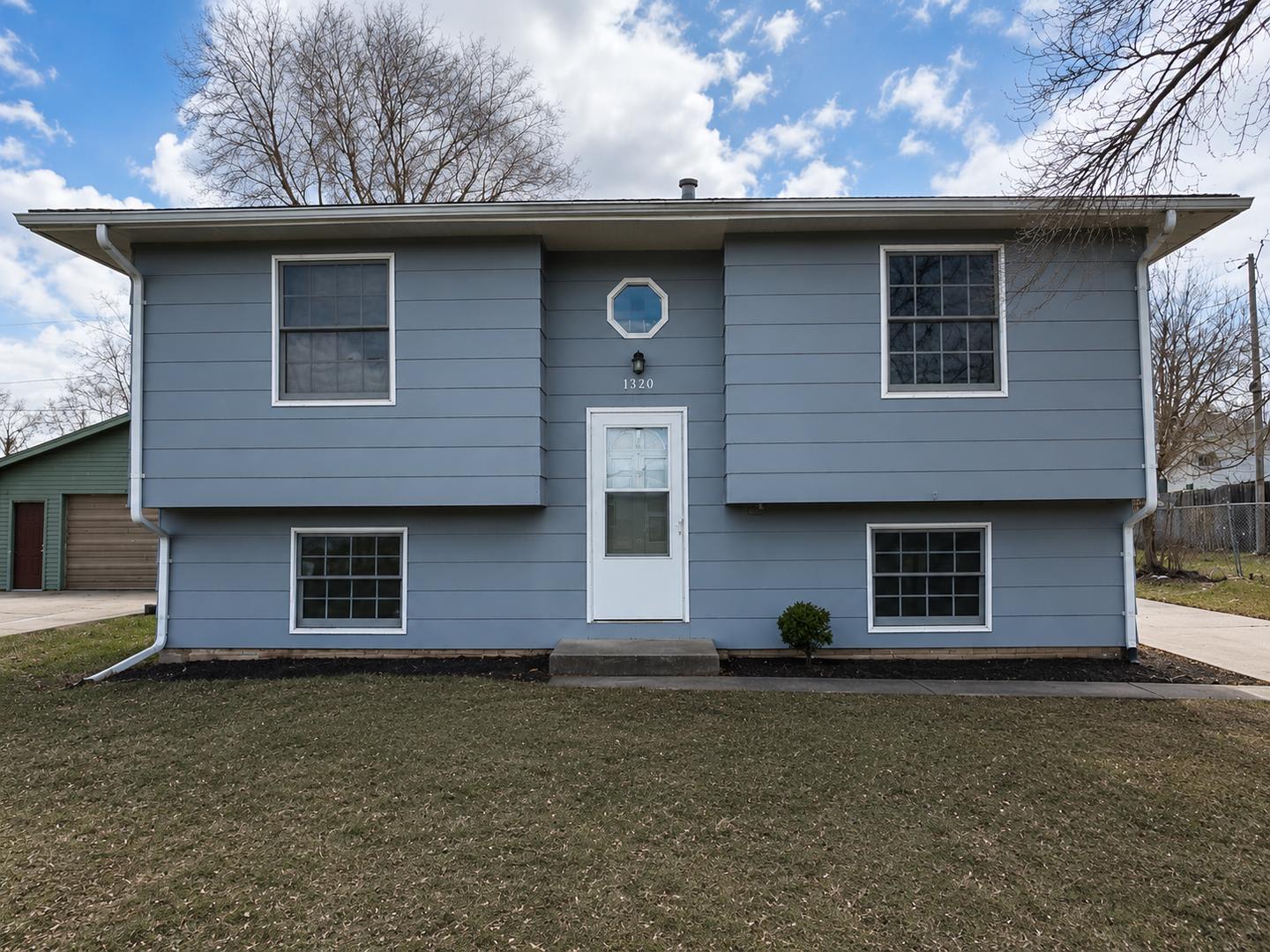 Spacious Split-Level Home With Garage and Fenced Yard in Rock Island! – photo 1 of 4
