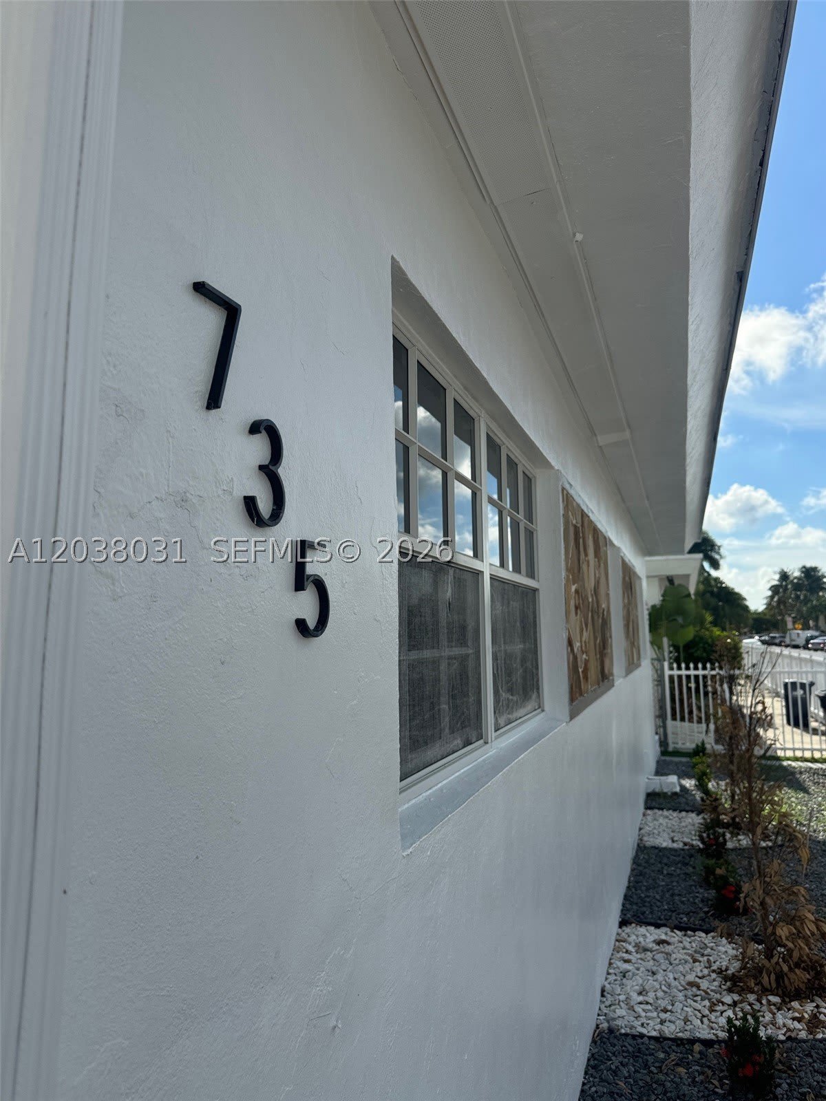 735 83rd St – photo 1 of 8