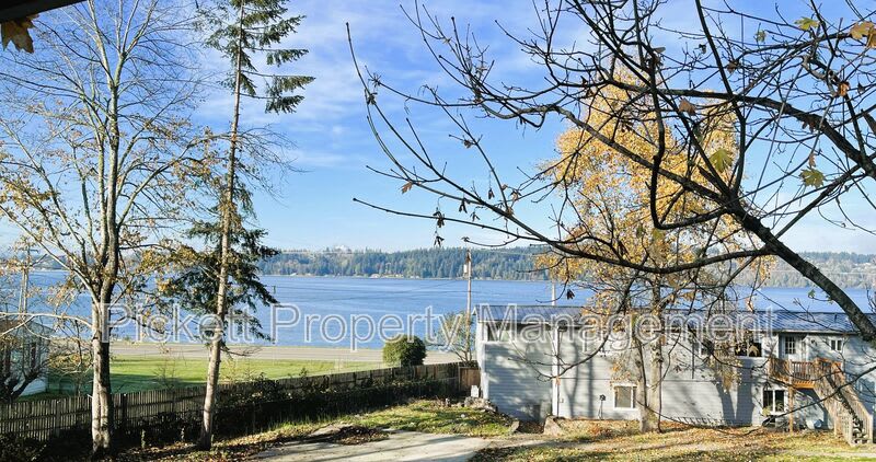 4619 Beach Dr E – photo 1 of 19