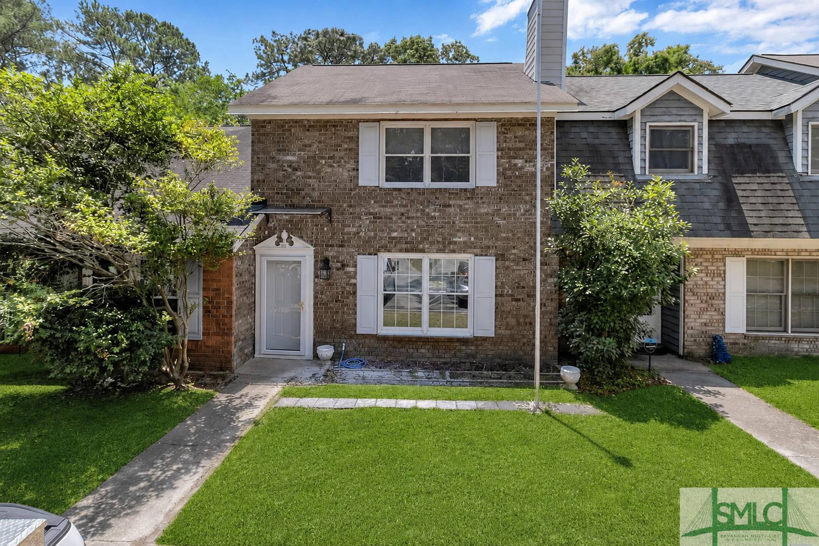 Spacious 2 Bedroom Brick Townhome With Private Fenced Yard – photo 1