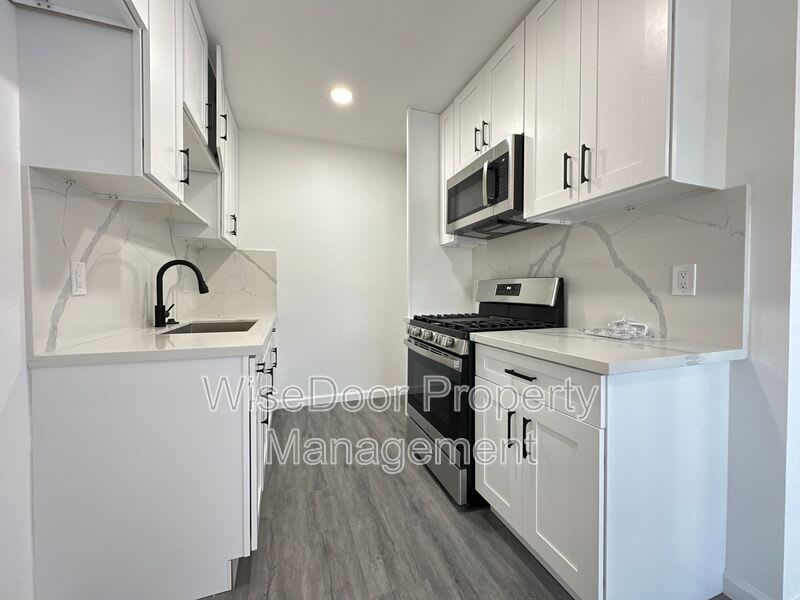 10392 Lampson Ave – photo 1 of 63