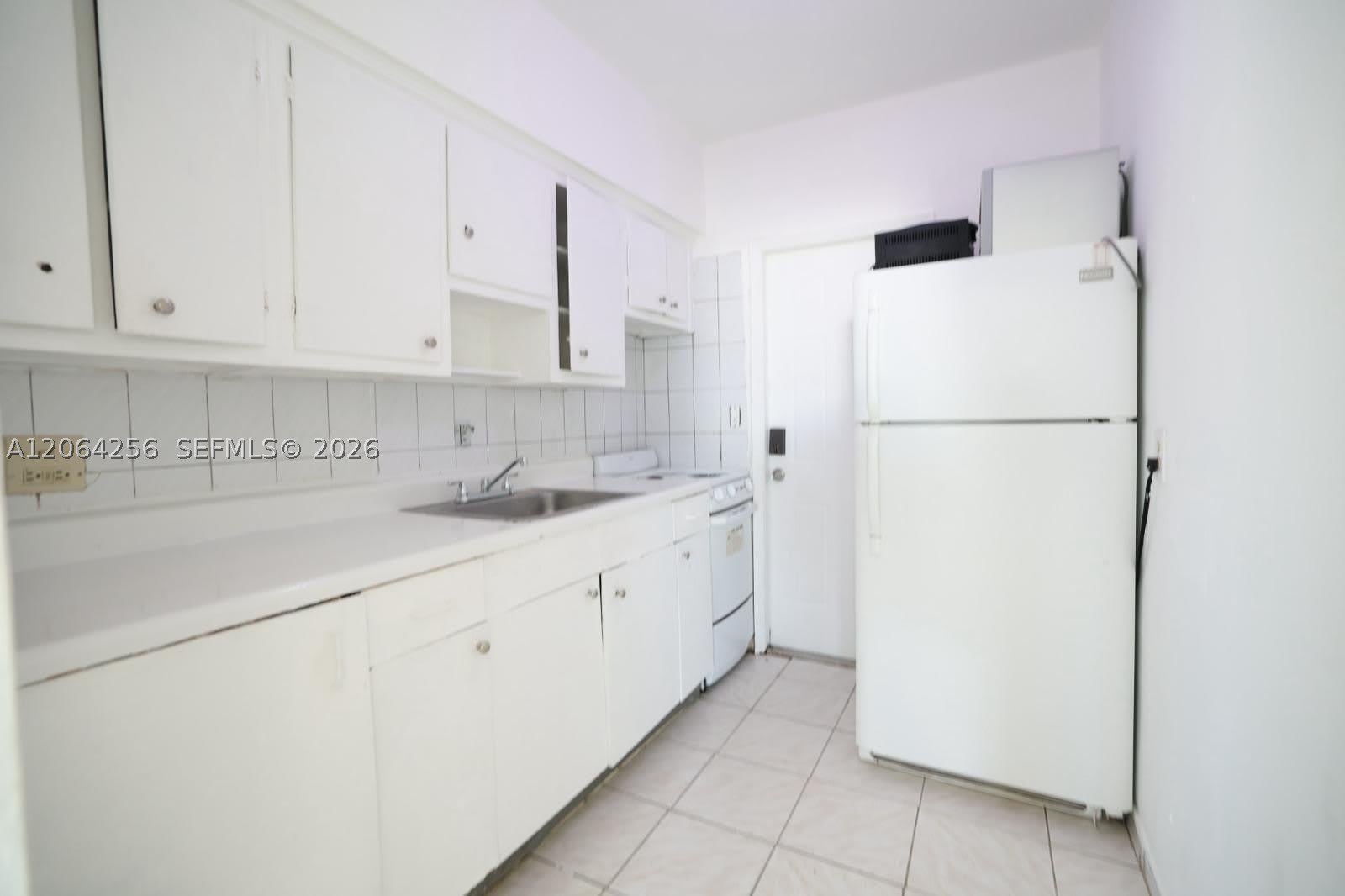 770 83rd St – photo 1