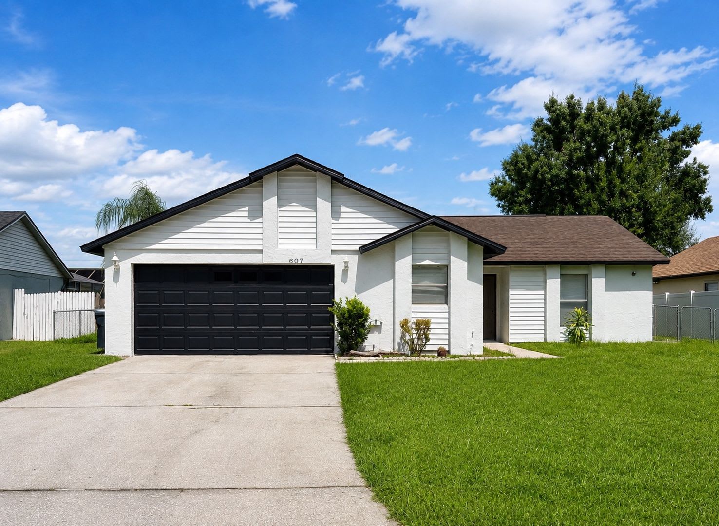 Move-In Ready Poinciana Gem with a Brand-New Kitchen & Screened Porch! – photo 1