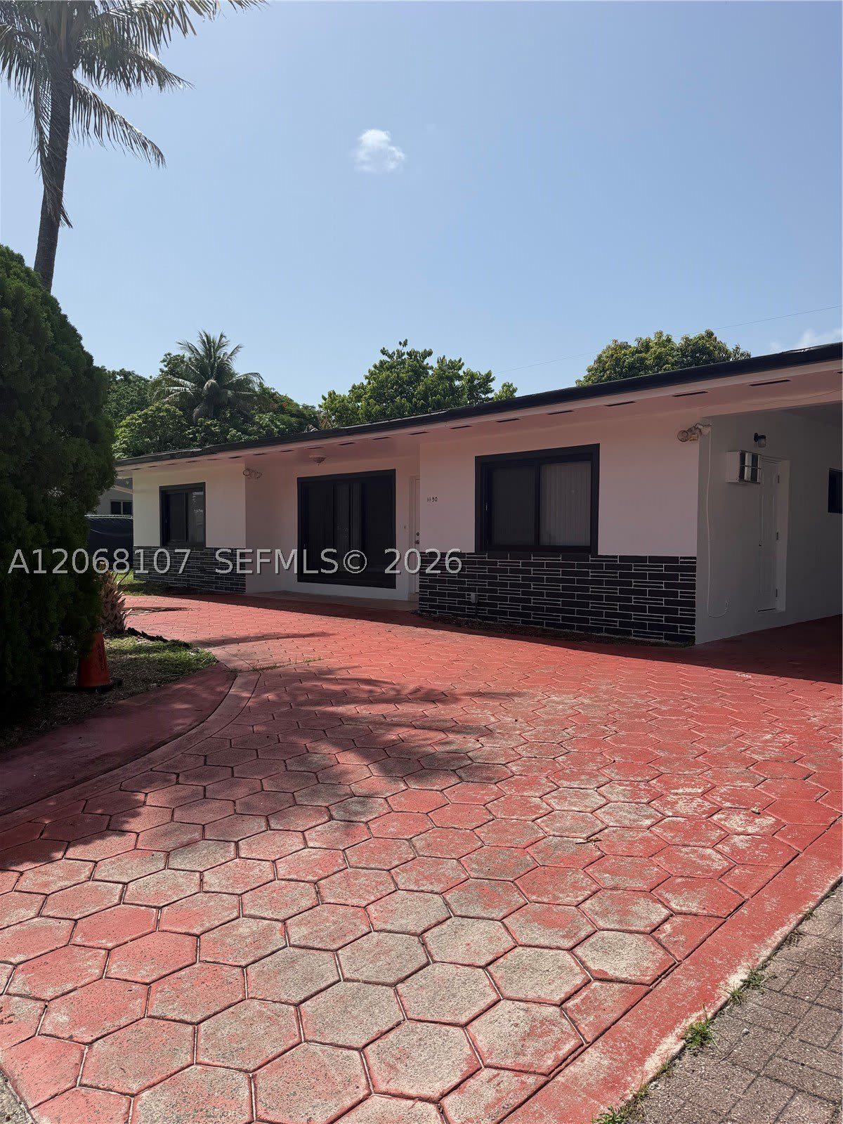 1150 NE 201st Ter – photo 1