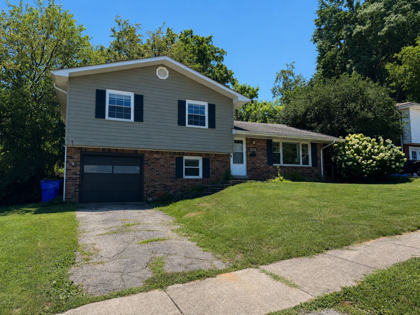 AVAILABLE NOW! Spacious 4 BR, 2 Bath House! Wood Floors, Attached Garage, W/D Included – photo 1