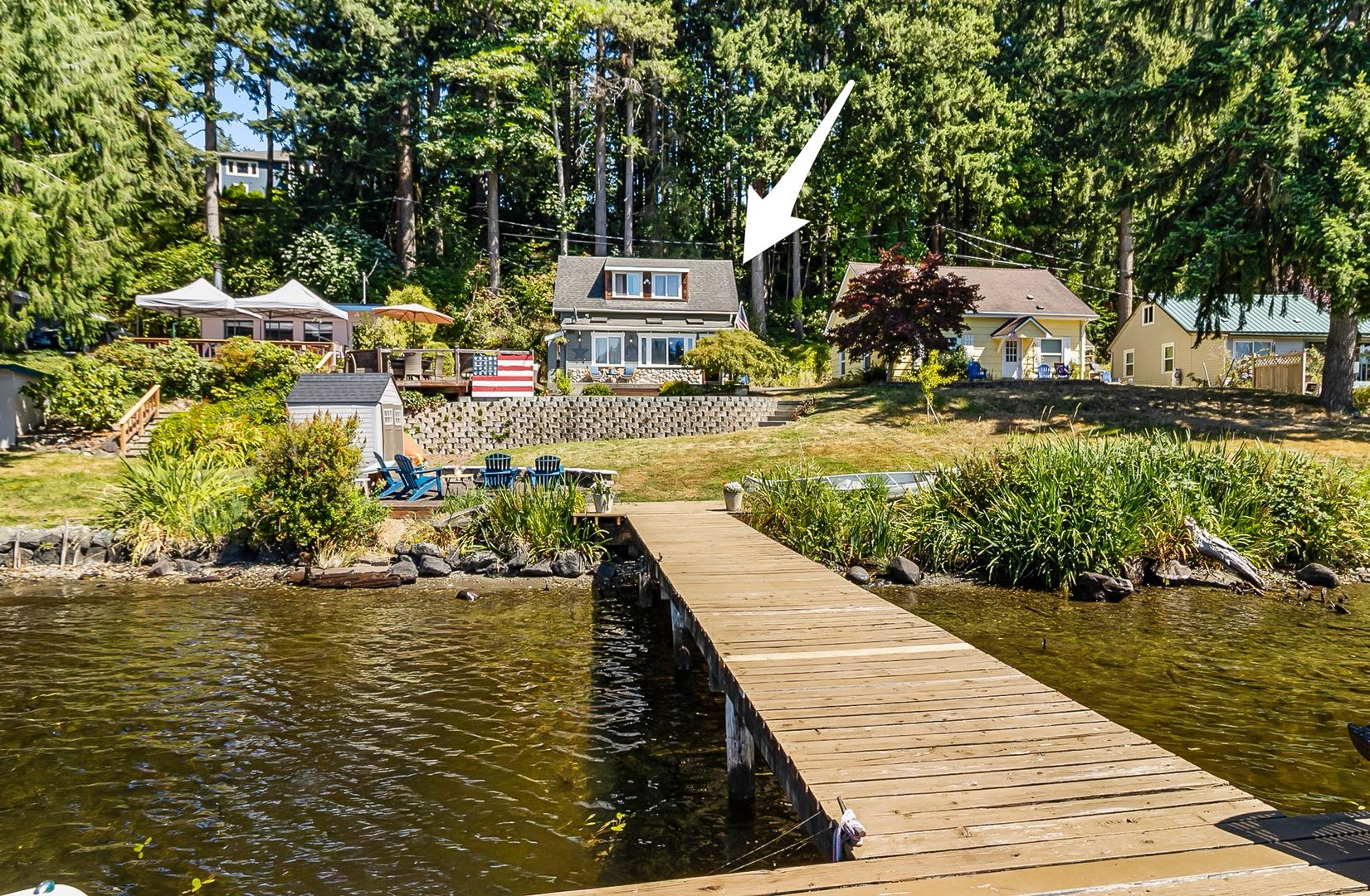 LIVE ON FLOWING LAKE! Cozy Lakefront Cabin Available September 2026–June 2027! – photo 1 of 12