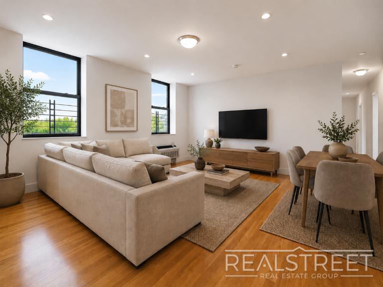 90-02 Queens Blvd – photo 1
