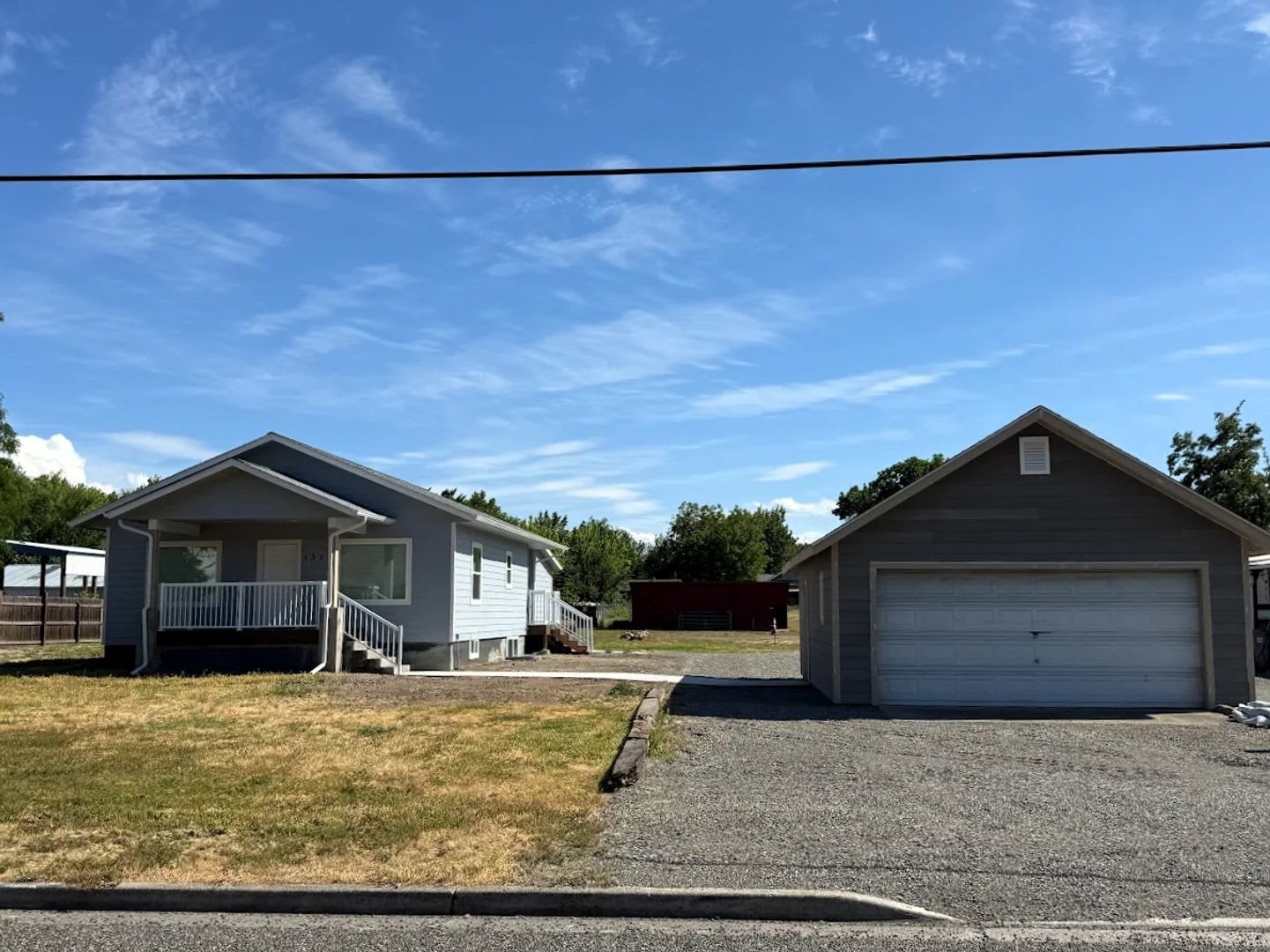 Spacious 4-Bedroom Home with Detached Garage & Large Yard in Clarkston – photo 1 of 48