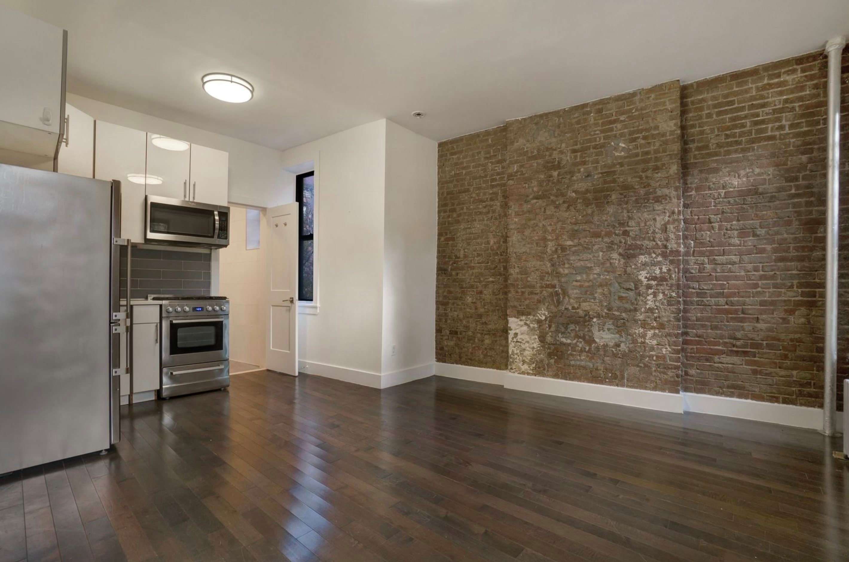 66 E 1st St – photo 1