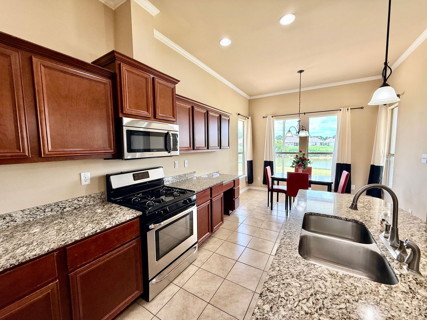 Beautiful 4BR Home with Scenic Lake View Backyard – photo 1 of 31