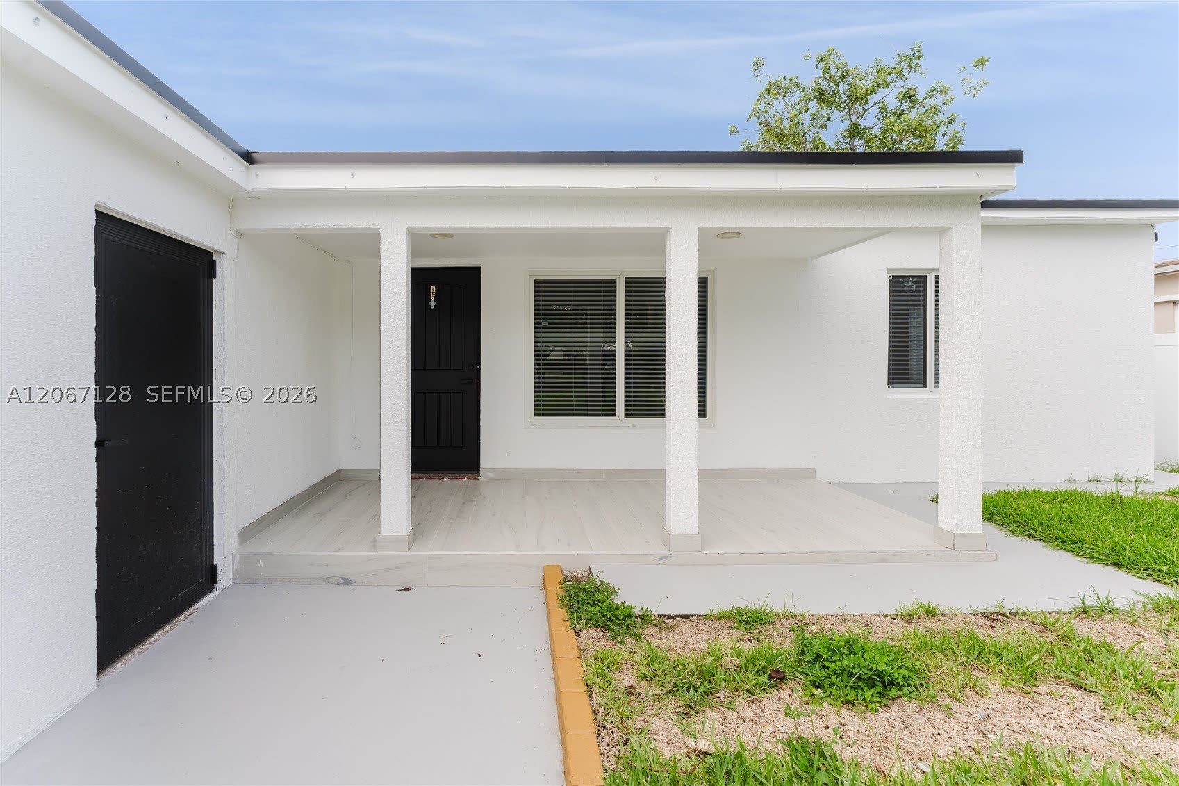 481 NE 51st St – photo 1
