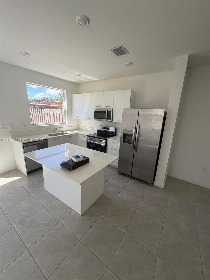 12213 NW 23rd Place 12213, Miami, FL 33167 – photo 1 of 11