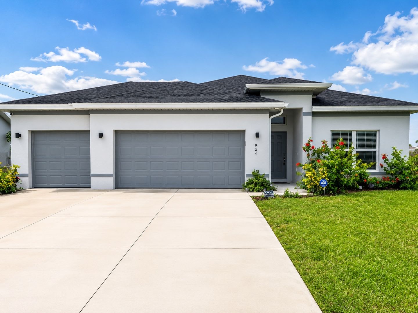 Modern Cape Coral Home with 3-Car Garage, Designer Upgrades & Flexible 4-Bedroom Layout! – photo 1