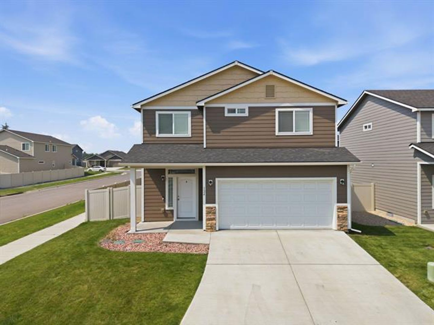 Two-Story Home in Spokane Valley with a Fully Fenced Yard! – photo 1 of 33