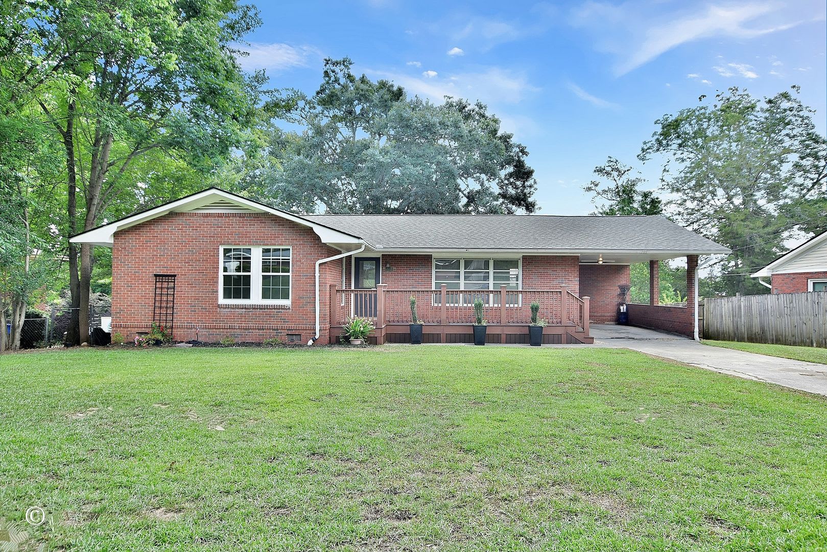 3 Bedrooms 2 Baths 1 Carport – photo 1
