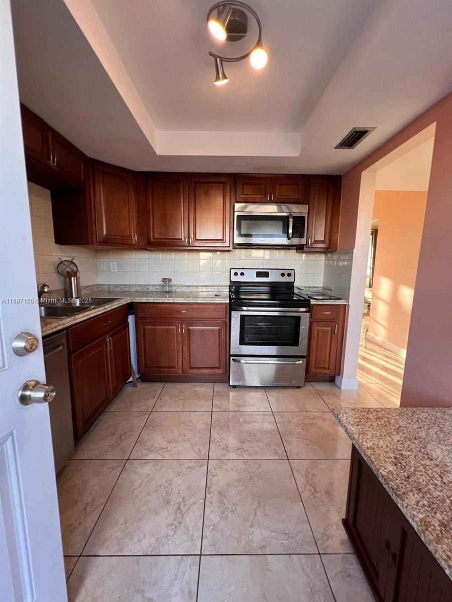 1591 NE Miami Gardens Dr – photo 1 of 7