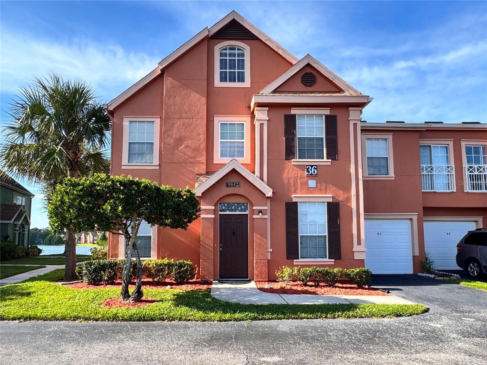 9842 Lake Chase Island Way – photo 1 of 26