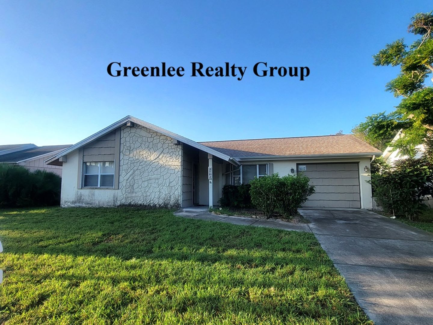 Spacious 2/2 home in Holiday—move-in ready and close to the beach! – photo 1 of 21