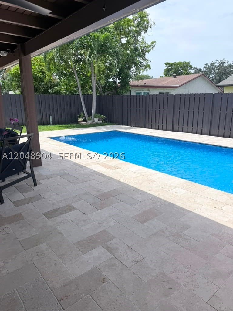 9211 NW 32nd Pl – photo 1