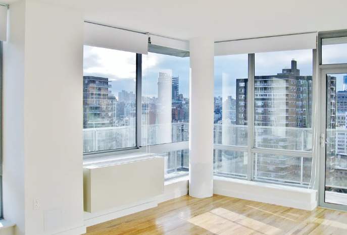 393 W 25th St – photo 1