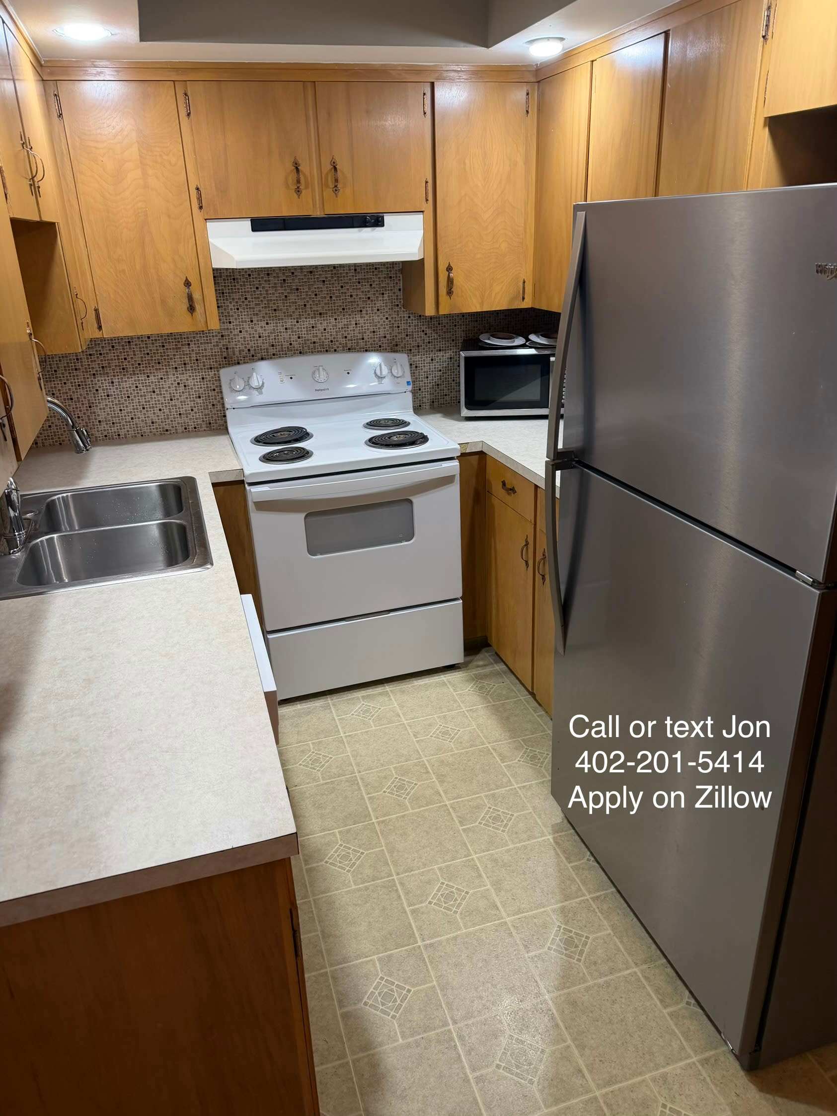 8203 Q Street – photo 1 of 10