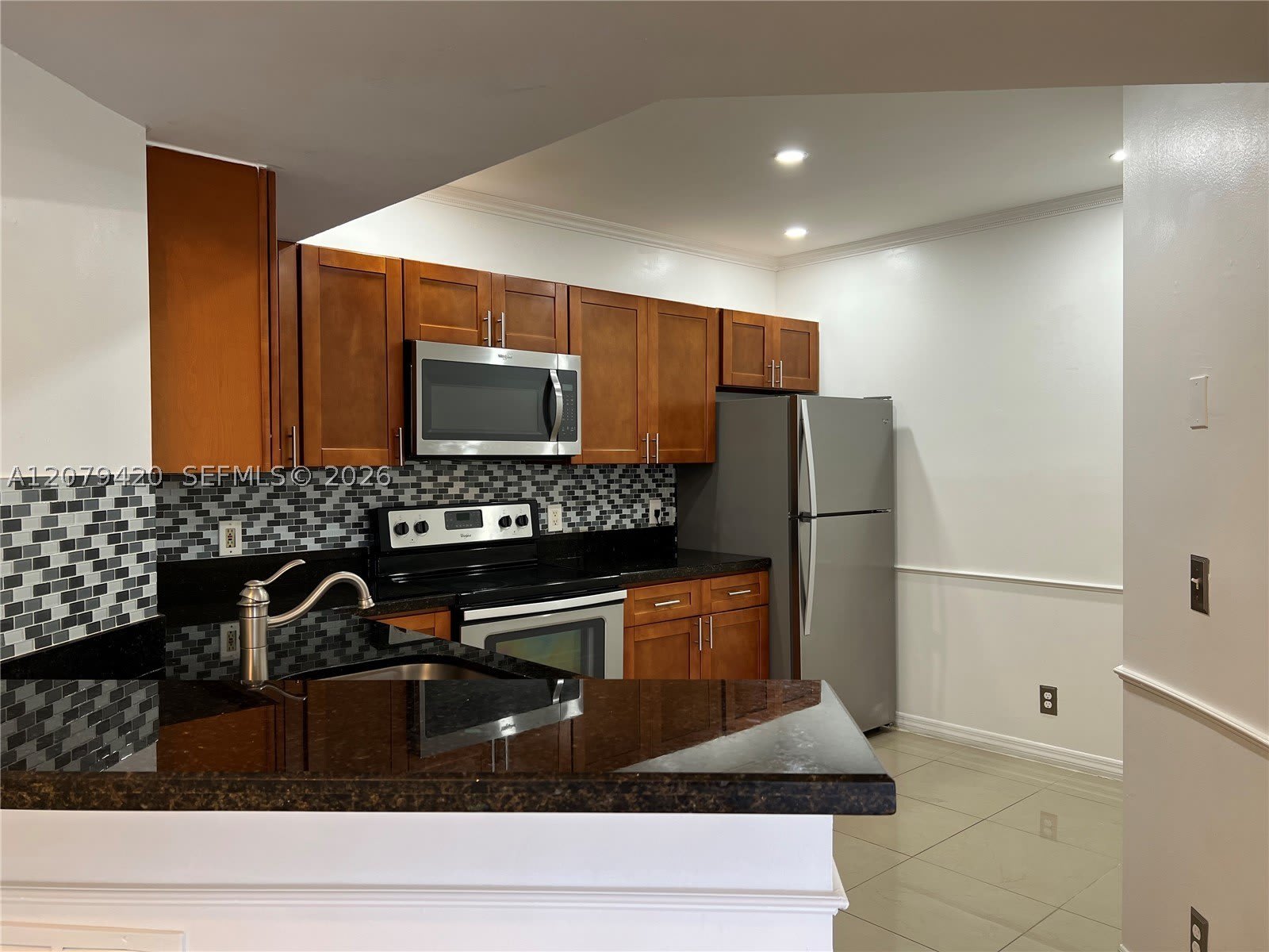 8721 Wiles Rd – photo 3