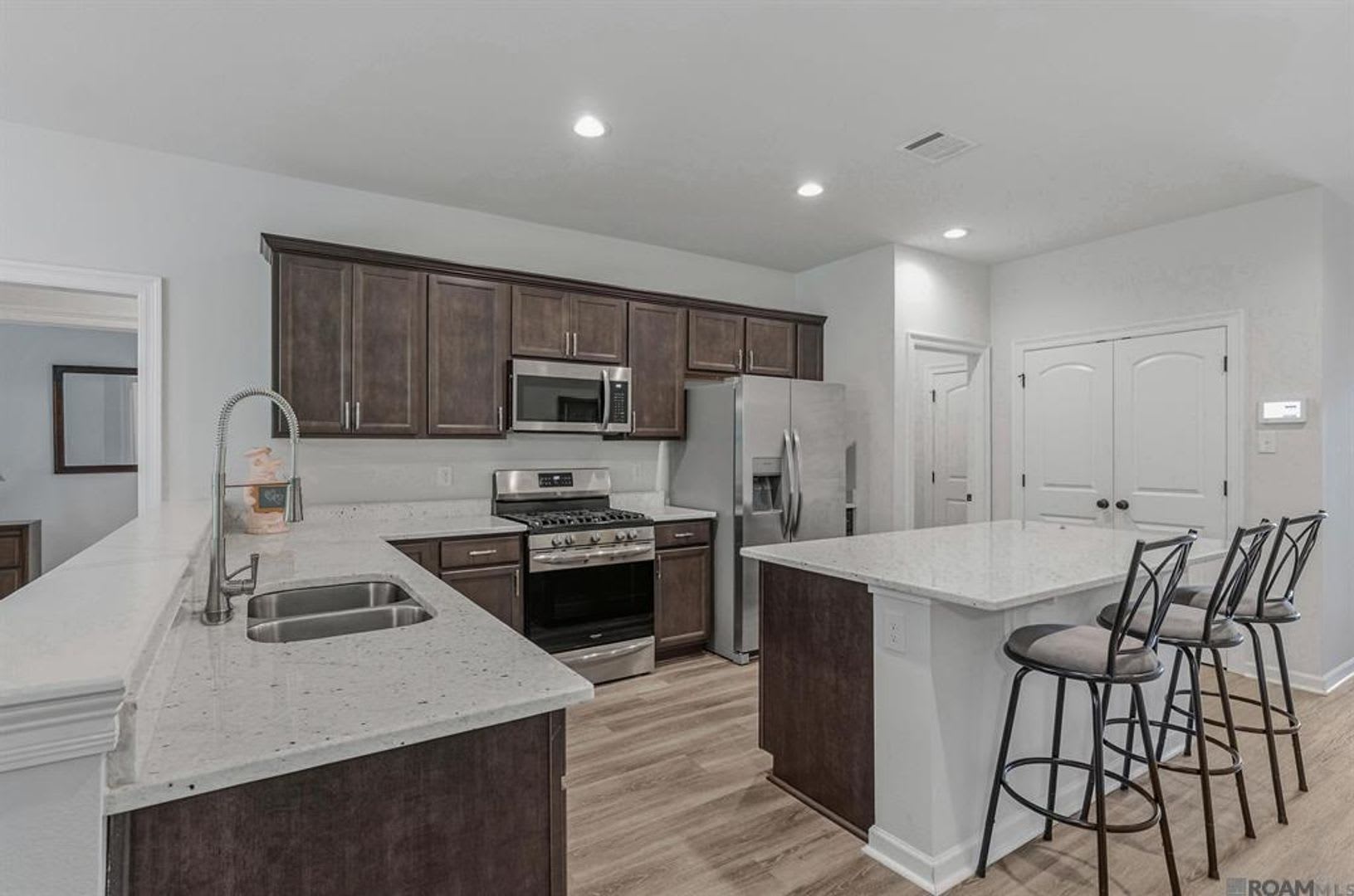 Modern 3 Bedroom Home with Private Backyard Views in Forestwood – photo 3