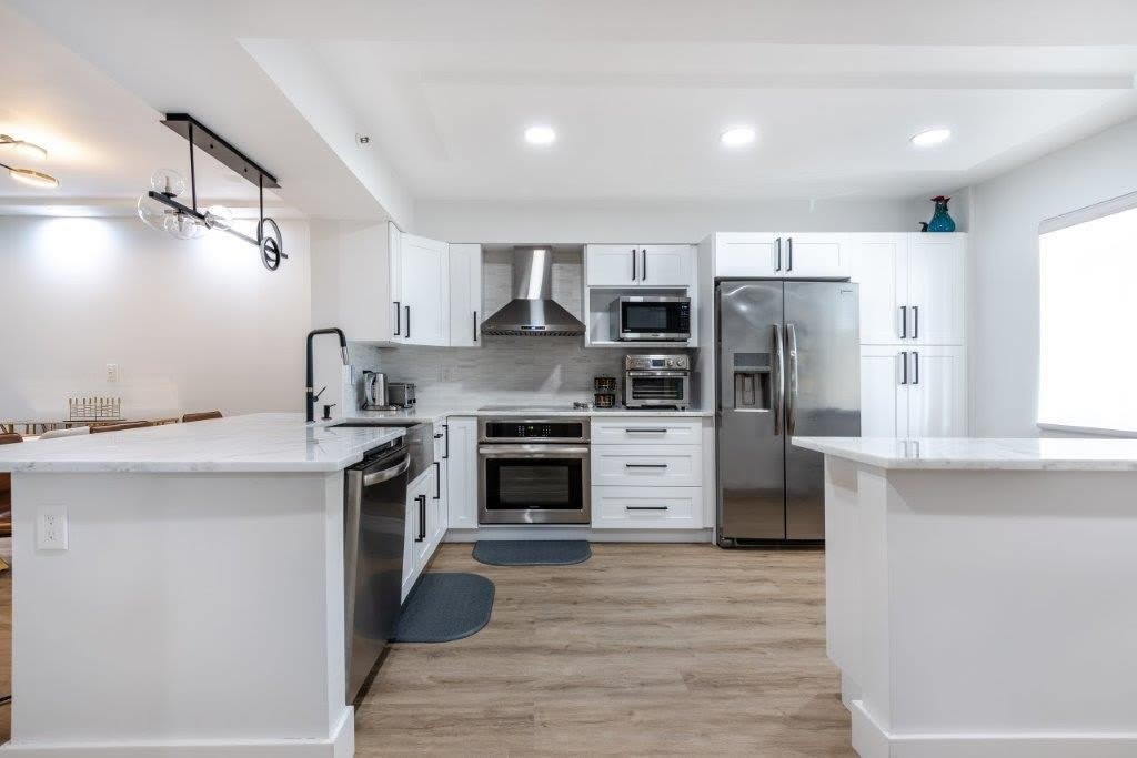 6096 Huntwick Terrace – photo 2