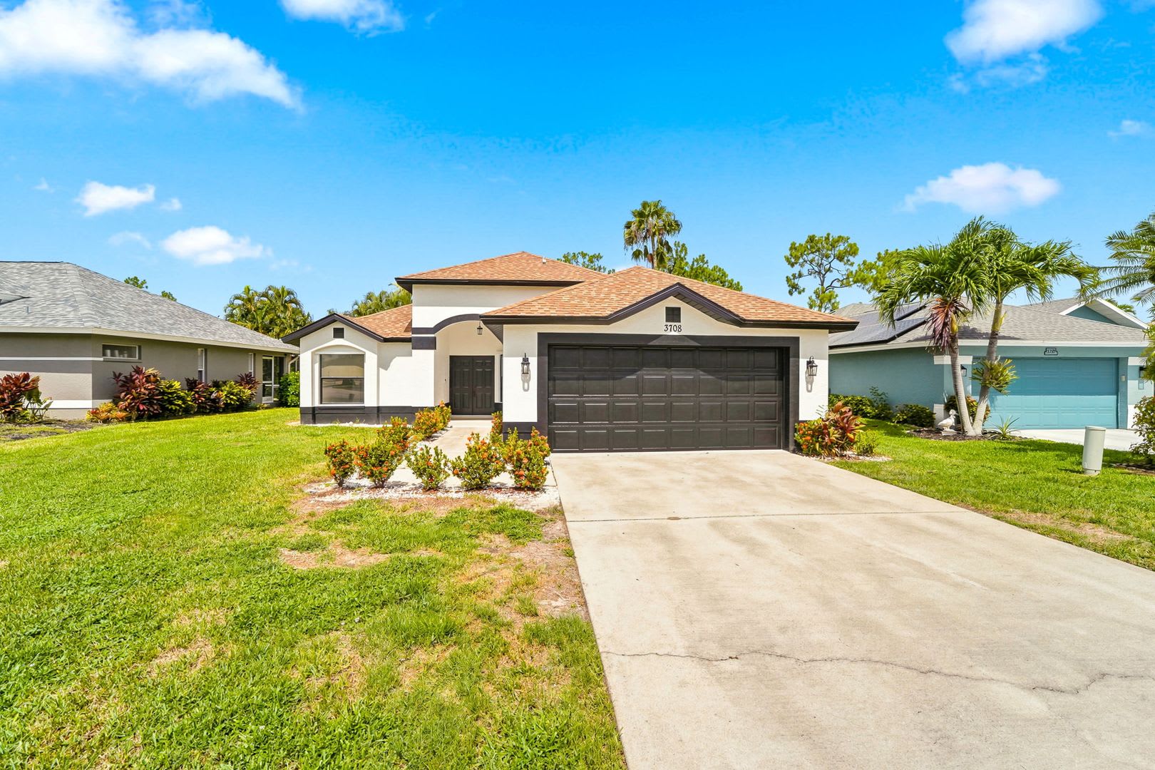 Newly renovated 3-bedroom, 2-bath single-family residence located in the Queens Park community. – photo 1