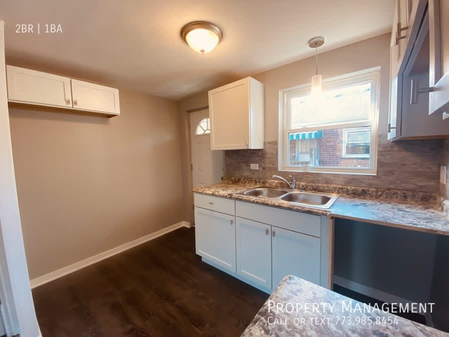 8153 South Colfax Avenue – photo 3