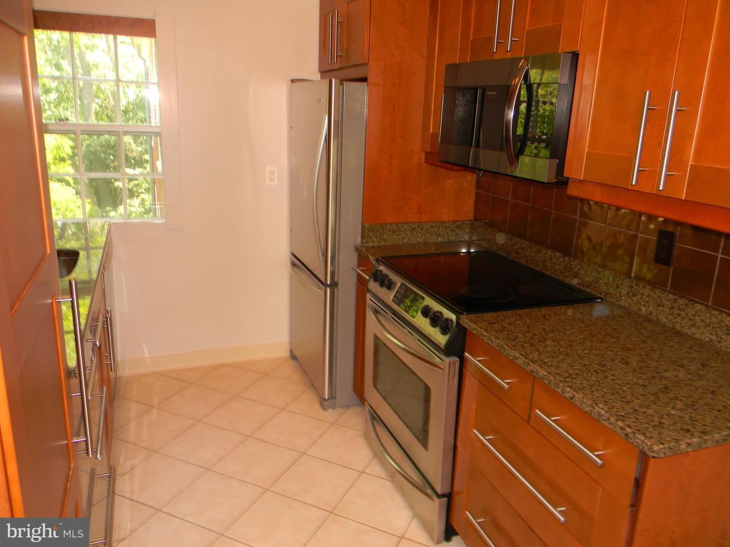 This Loft unit is unlike anything you have ever seen in McLean Gardens. – photo 3