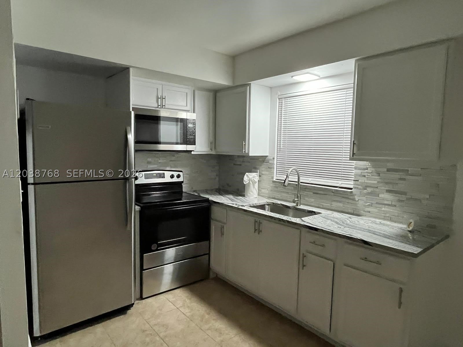325 NE 2 ST – photo 1