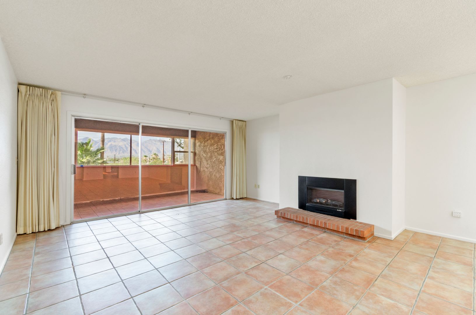 Spacious Condo! 2 LARGE Bedrooms + BONUS AC Sunroom/Porch! – photo 5