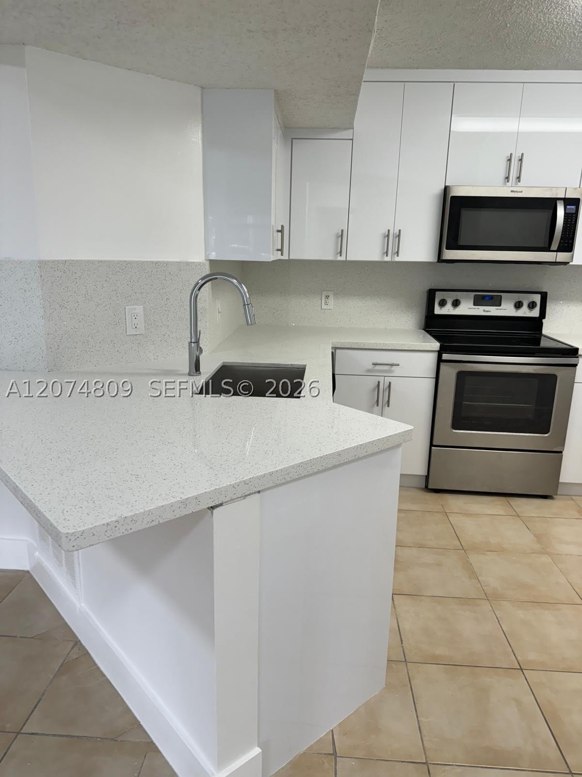 8801 Wiles Rd – photo 5