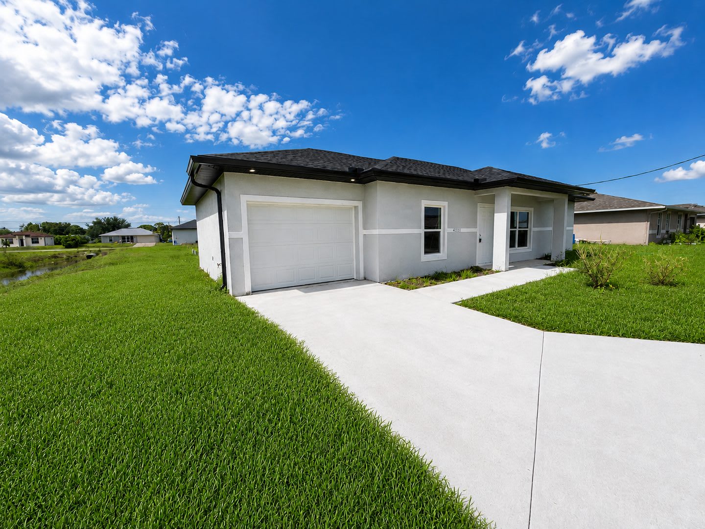 BRAND NEW MODERN SF HOME 3BD+den/2BA with GARAGE IN LEHIGH ACRES! – photo 2