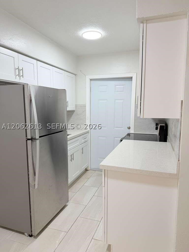 310 NE 78th St – photo 3