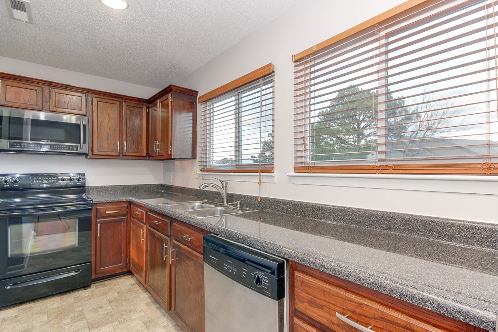 Surprisingly Spacious 3-Story Townhome With Garage and Huge Back Yard – photo 3