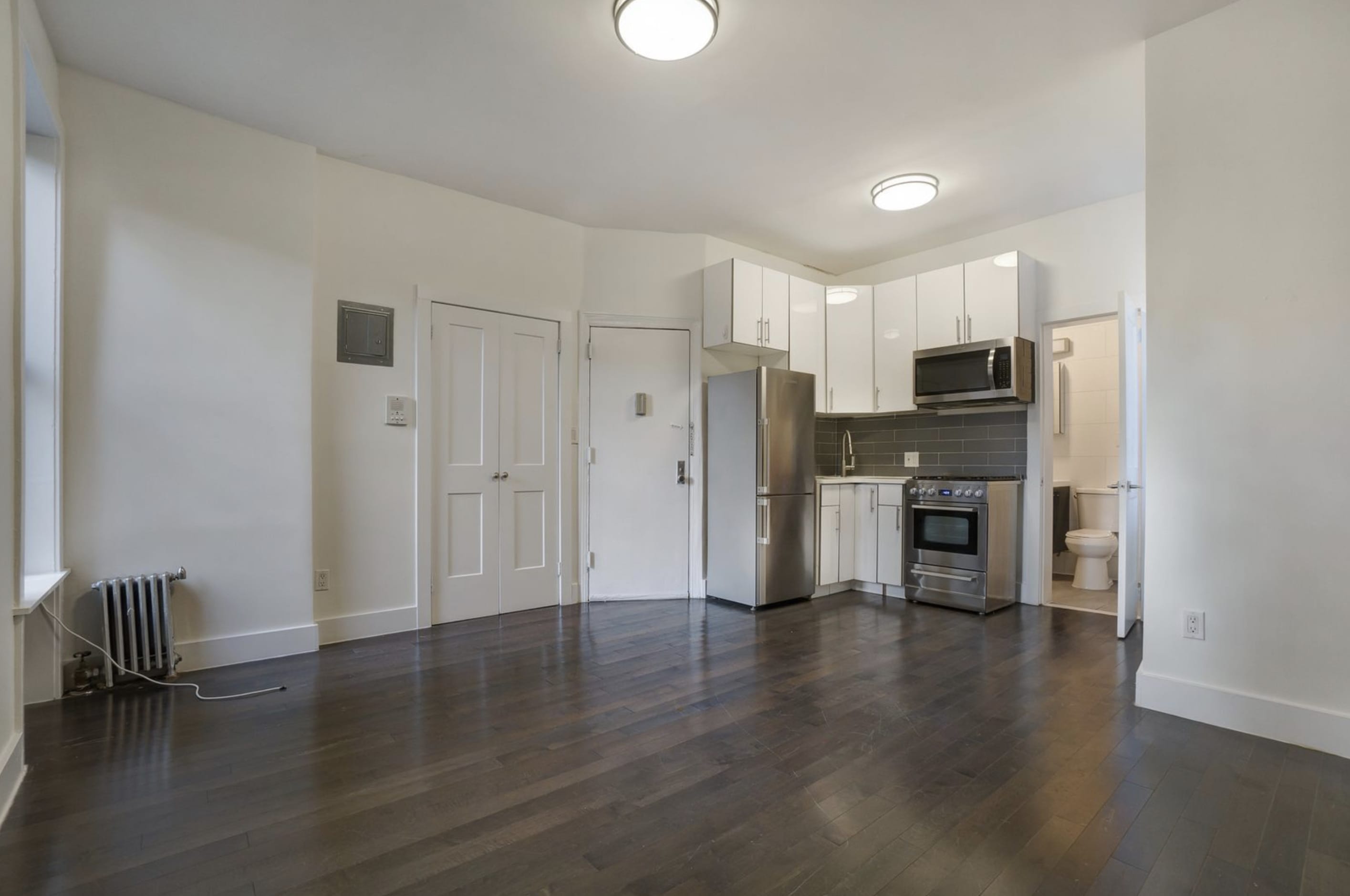 66 E 1st St – photo 2
