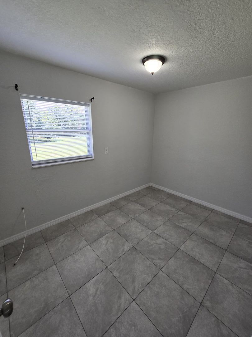 Beautiful Open Floor Plan 2 Bedroom 1 Bathroom Home 2 Car Parking Open Kitchen With Wood Cabinets And Newly Installed Tile Flooring Throughout The Home – photo 4