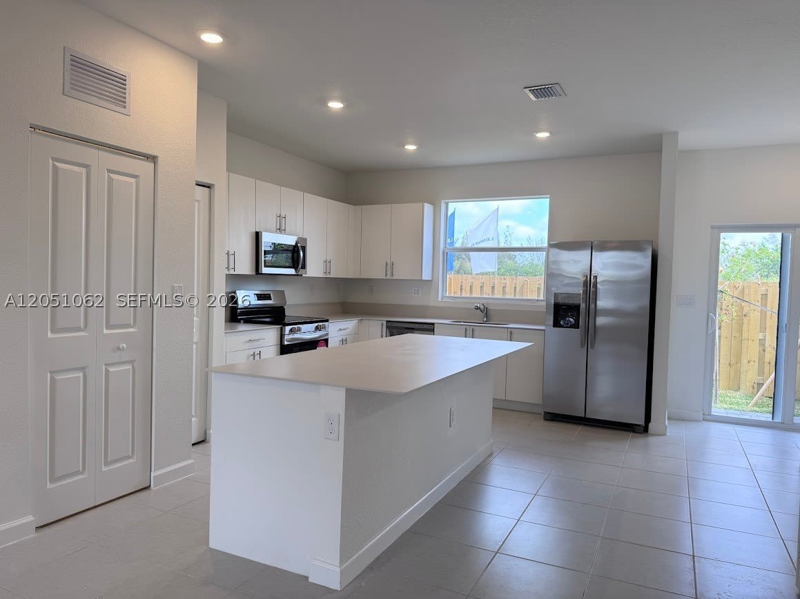 1182 SE Palm Ter – photo 4