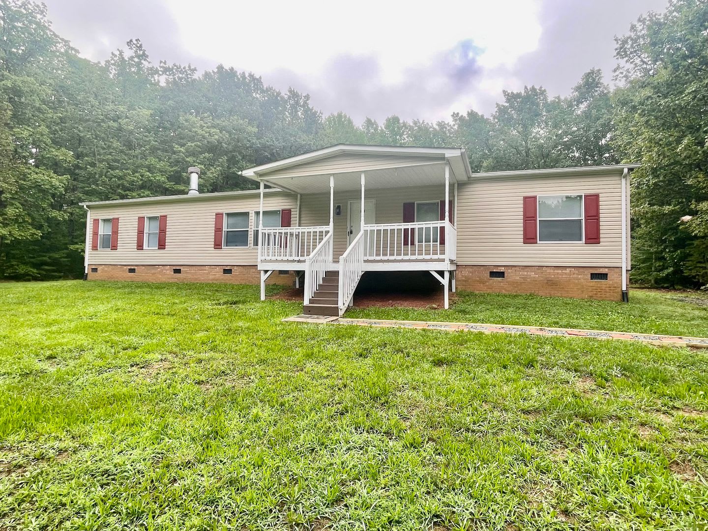 Discover this 4-bedroom, 2-bath home in Claremont, NC – photo 1