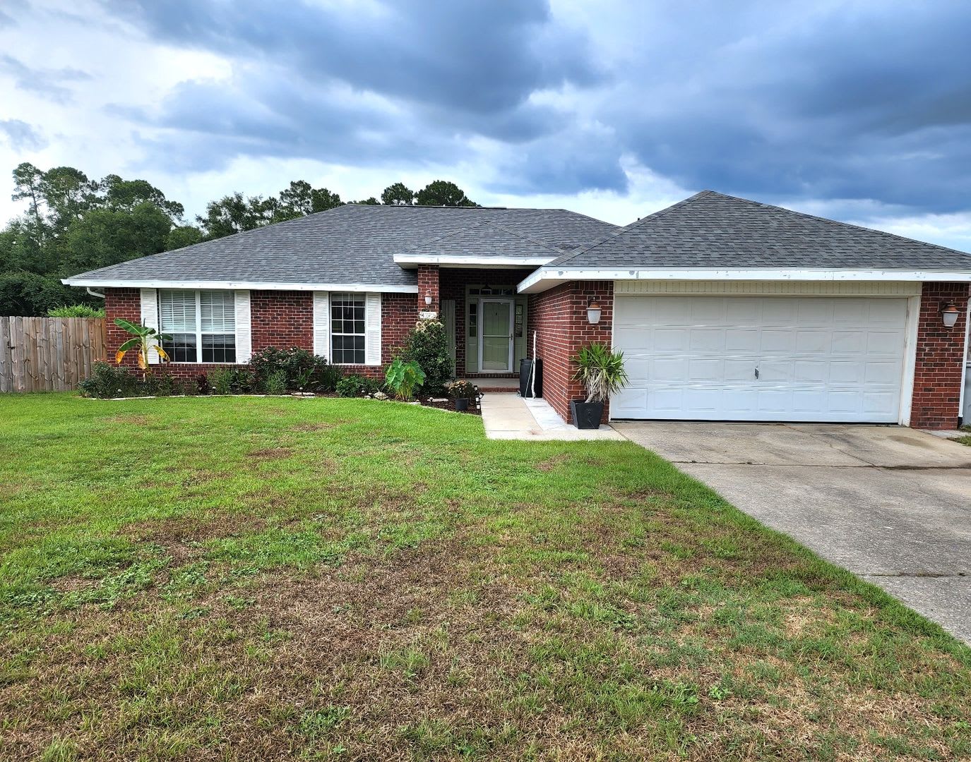 Adorably Styled and Updated 4 bedroom 2 bath Brick home located in Pace Community of La Floresta! – photo 1