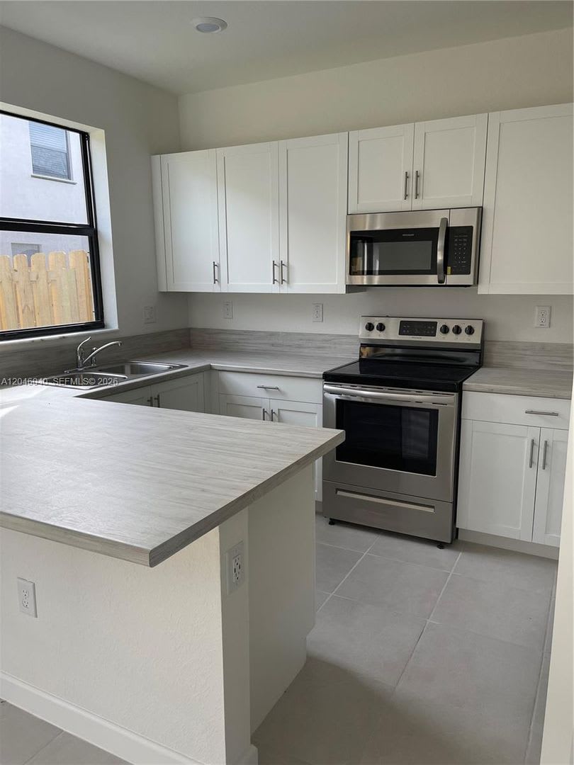 21447 NE 2nd Place, Miami, FL 33179 – photo 1