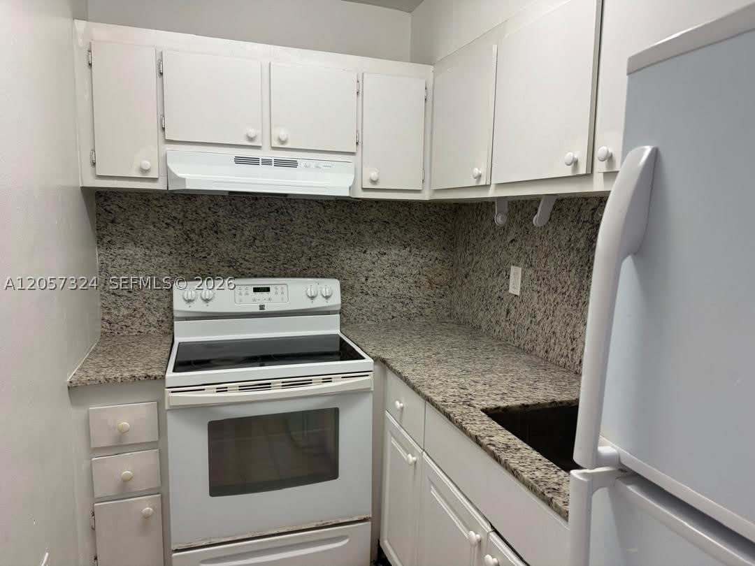 4725 NW 7th St – photo 1