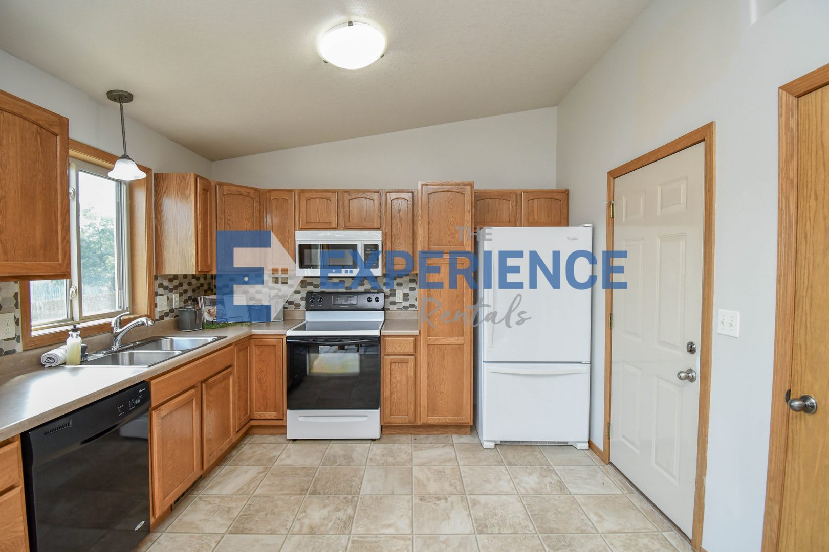 Spacious Ranch Home with 3-Car Garage, Finished Basement & Fenced Yard! – photo 3