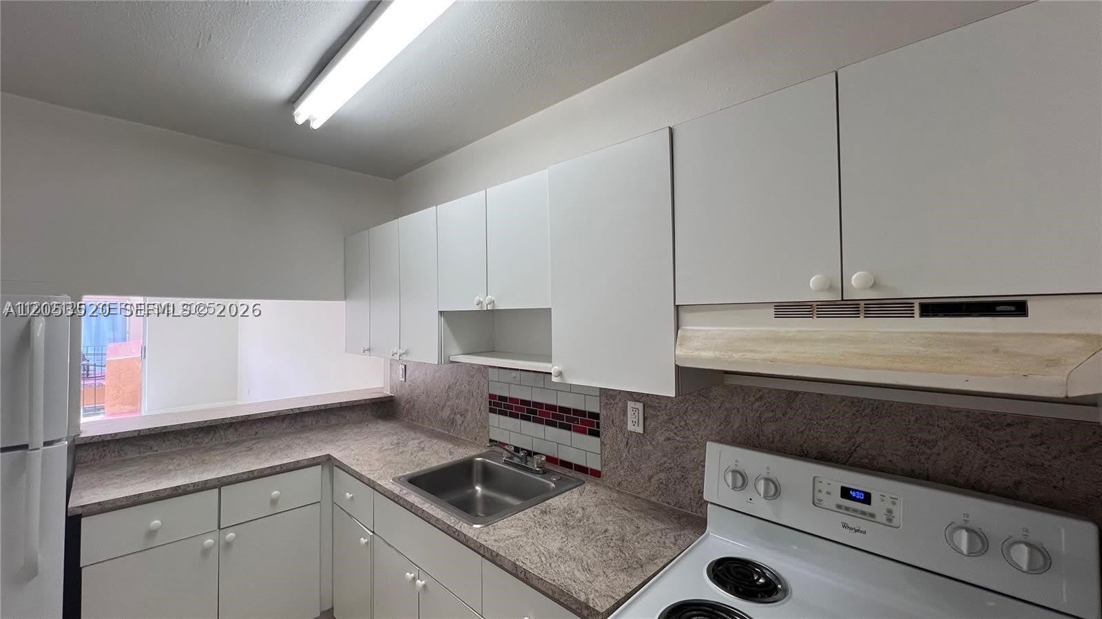 3675 W 11th Ave – photo 5
