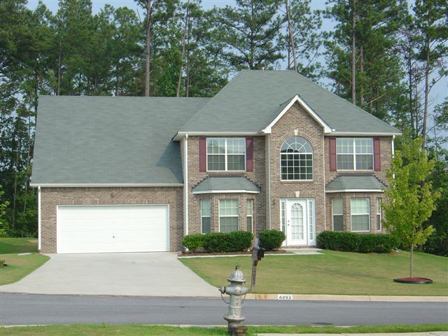 EXECUTIVE HOME IN SWIM COMMUNITY NEAR CAMP CREEK! – photo 1