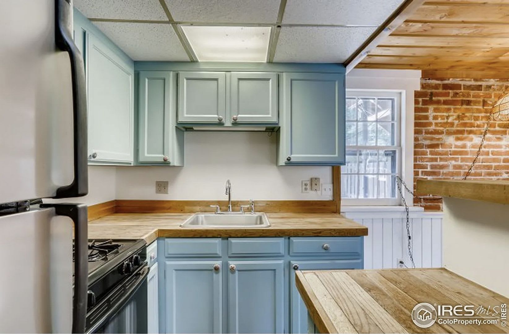 Charming Historic Carriage Home Steps From Pearl Street Boulder Living At Its Finest – photo 2