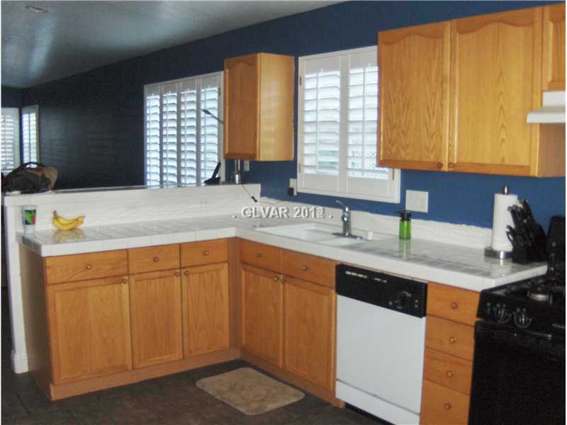1 story home with 2 car garage in a gated community – photo 4