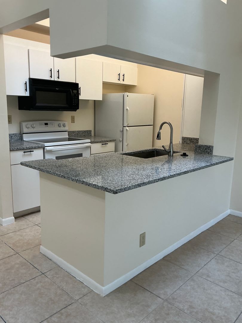 2/2 CONDO IN THE DESIRABLE RIVERFRONT GATED COMMUNITY OF ANCHORAGE COVE. – photo 2